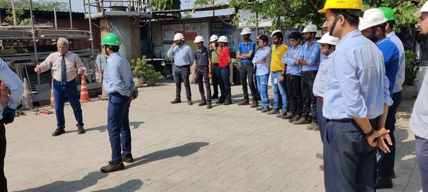 Practical Safety Training Session With Workers At An Industrial Site